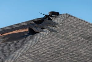 Roof Damage on Shingle Asphalt Roof